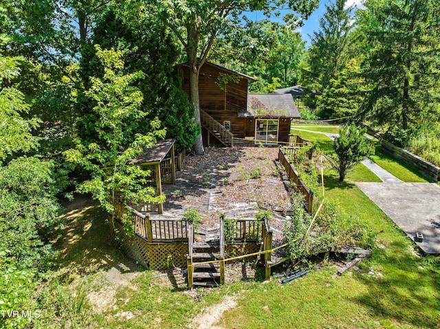285 Vanover Ln, Jacksboro, TN 37757 - view of green lawn featuring stairs and a wooden deck