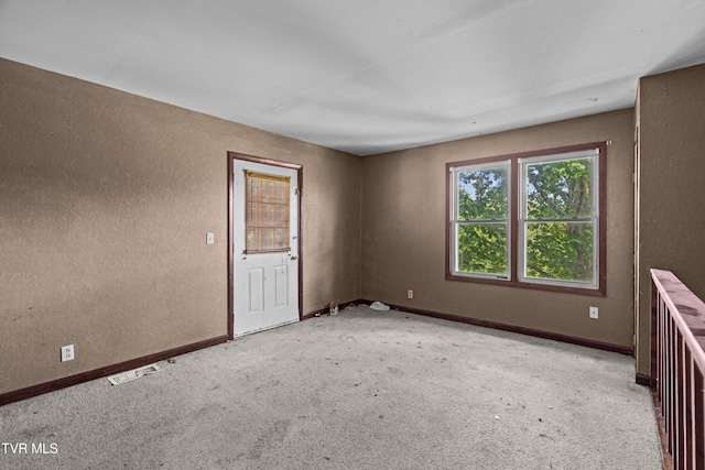 285 Vanover Ln, Jacksboro, TN 37757 - spare room with a textured wall and carpet