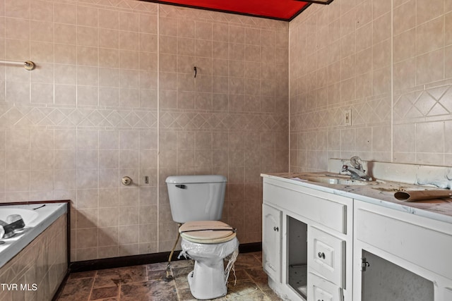 285 Vanover Ln, Jacksboro, TN 37757 - full bathroom with tile walls, vanity, and a relaxing tiled tub