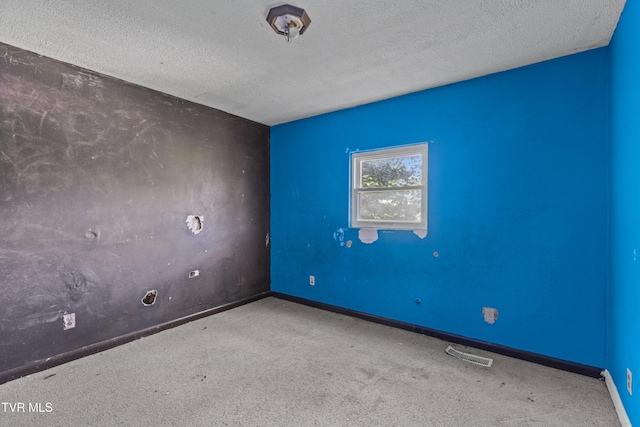285 Vanover Ln, Jacksboro, TN 37757 - carpeted spare room with a textured ceiling and baseboards