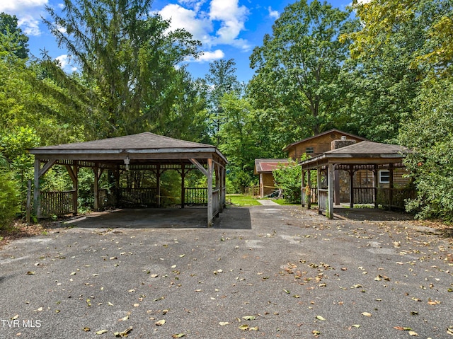 285 Vanover Ln, Jacksboro, TN 37757 - view of parking / parking lot with a detached carport and asphalt driveway