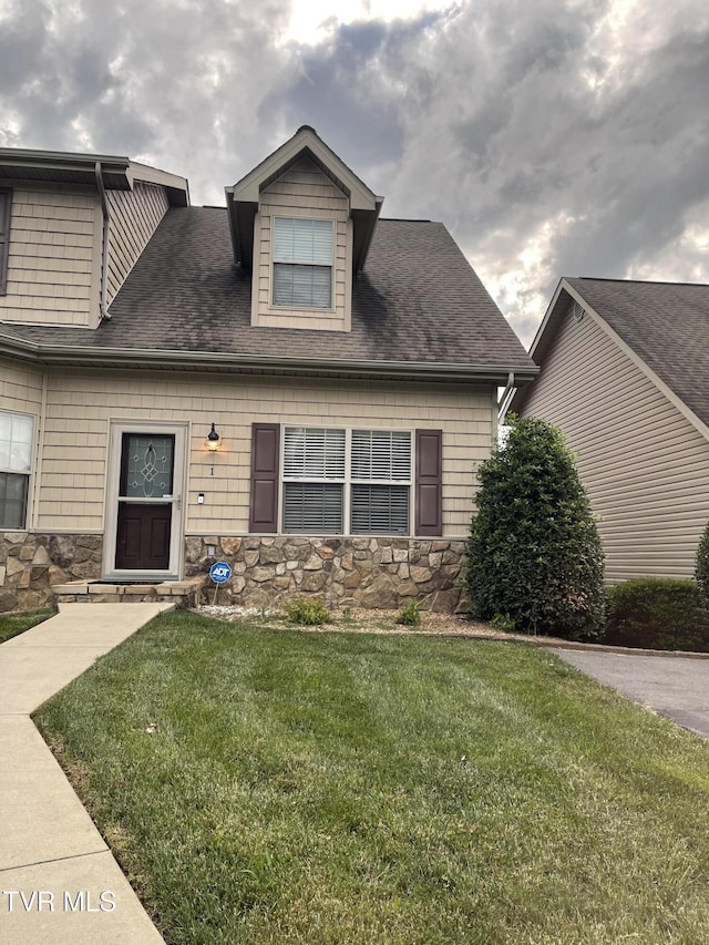 220 Cedar Creek Rd Unit 1, Johnson City, TN 37615 - view of front of home featuring a front yard, stone siding, and a shingled roof