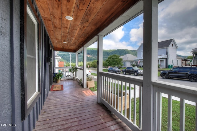 216 3rd St, Erwin, TN 37650 - wooden porch with a residential view