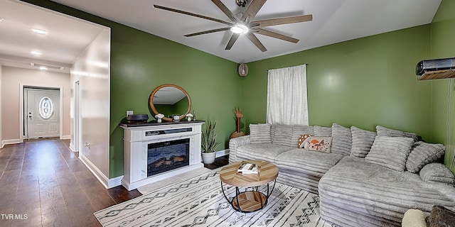 216 3rd St, Erwin, TN 37650 - living room with ceiling fan, a glass covered fireplace, and wood finished floors
