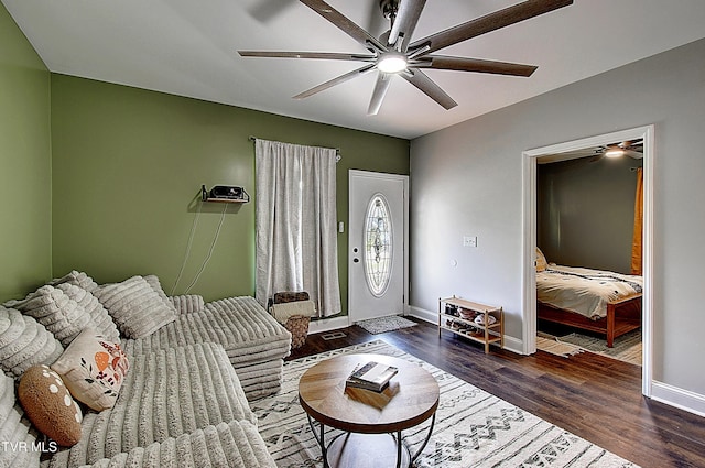 216 3rd St, Erwin, TN 37650 - living area with a ceiling fan and dark wood-style flooring