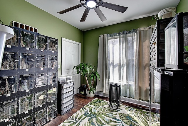 216 3rd St, Erwin, TN 37650 - office space featuring a ceiling fan, wood finished floors, and radiator