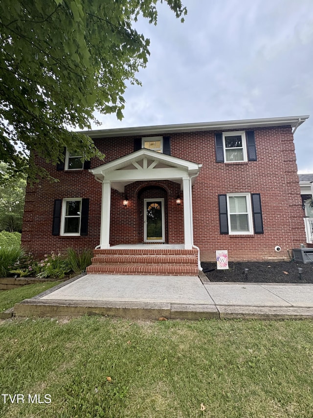 110 Galway Rd, Bristol, TN 37620 - view of front of house featuring brick siding and a front lawn