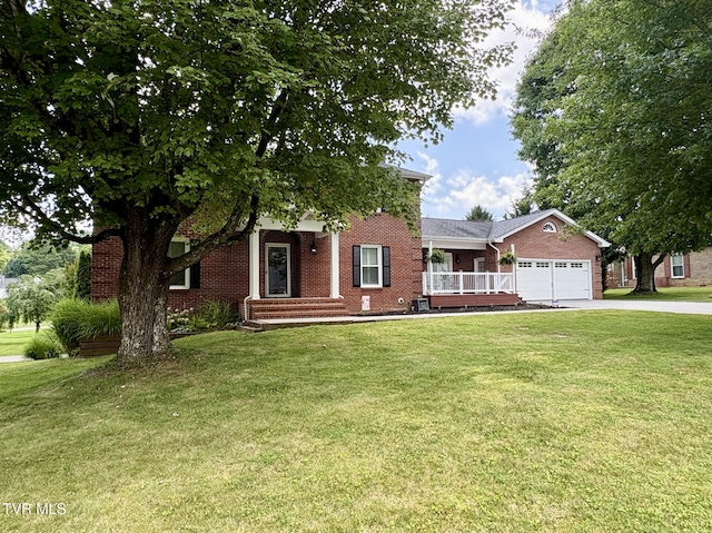 110 Galway Rd, Bristol, TN 37620 - view of front of house featuring brick siding, a garage, concrete driveway, and a front yard