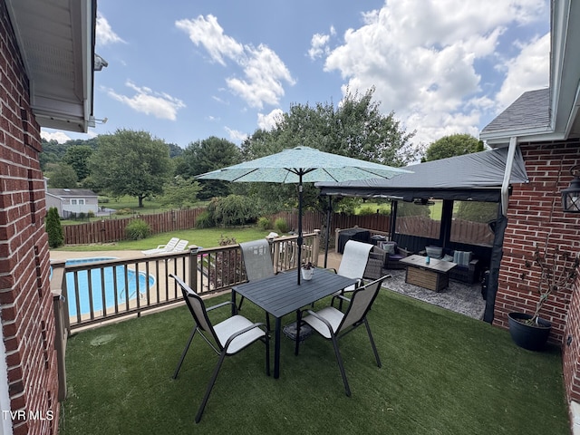 110 Galway Rd, Bristol, TN 37620 - fenced backyard with an outdoor living space, a patio, and outdoor dining space