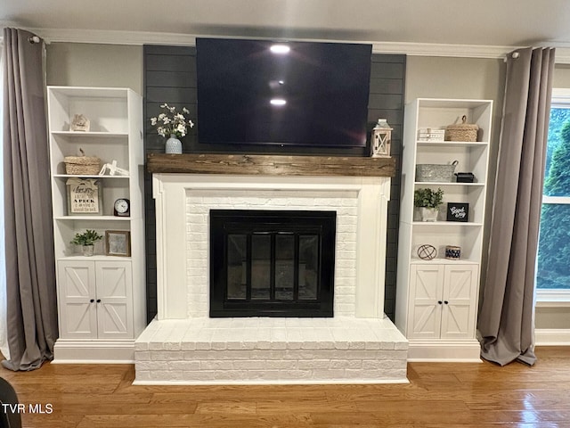 110 Galway Rd, Bristol, TN 37620 - detailed view of a fireplace, ornamental molding, and wood finished floors