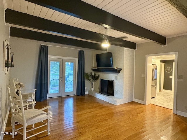 110 Galway Rd, Bristol, TN 37620 - living area with wood finished floors, french doors, a wooden ceiling with exposed beams, and a fireplace