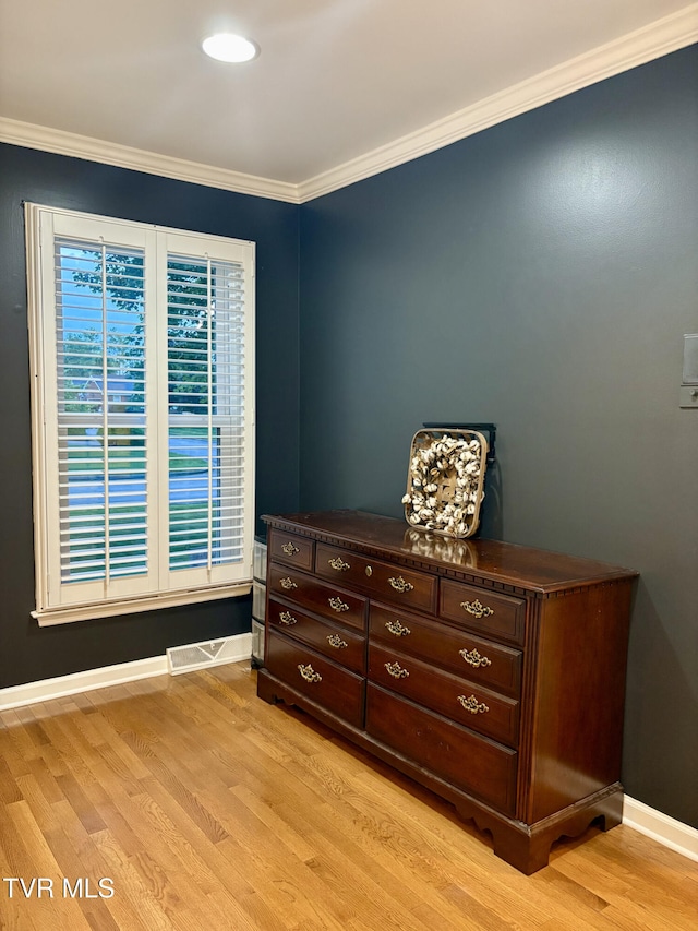 110 Galway Rd, Bristol, TN 37620 - bedroom featuring light wood finished floors and crown molding