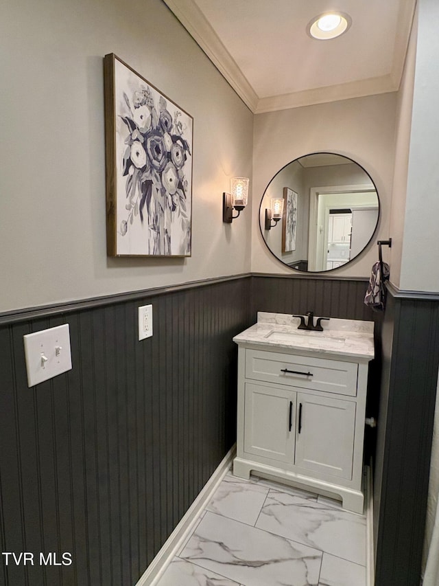 110 Galway Rd, Bristol, TN 37620 - bathroom with wainscoting, vanity, marble finish floors, crown molding, and wood walls
