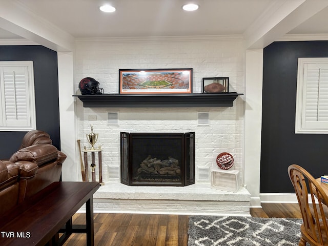 110 Galway Rd, Bristol, TN 37620 - living room with wood finished floors, a brick fireplace, ornamental molding, and recessed lighting