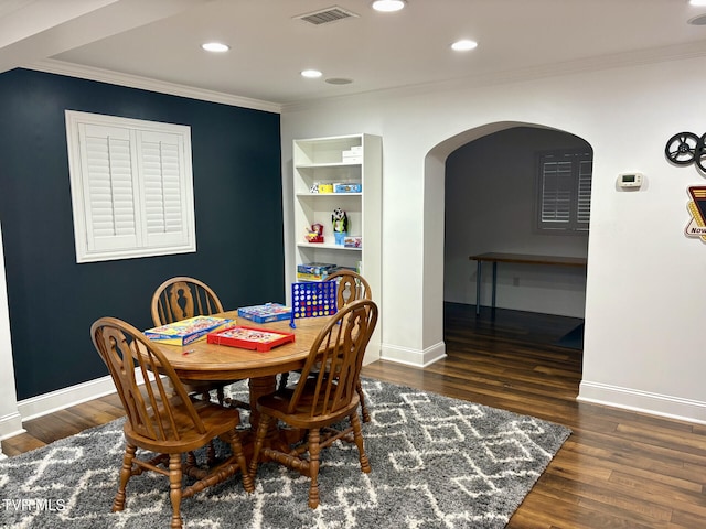110 Galway Rd, Bristol, TN 37620 - dining area featuring arched walkways, ornamental molding, wood finished floors, and recessed lighting