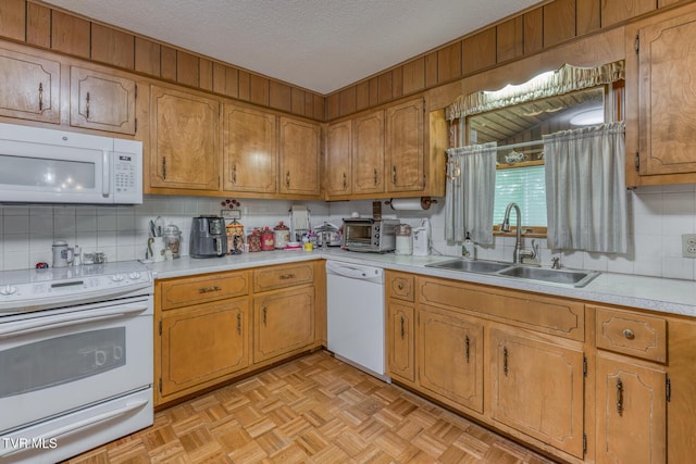 409 Brooklea Cir, Bluff City, TN 37618 - kitchen with white appliances, light countertops, backsplash, brown cabinetry, and a textured ceiling
