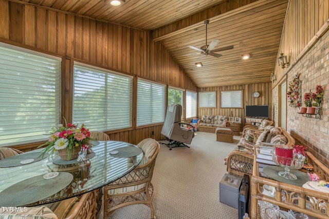 409 Brooklea Cir, Bluff City, TN 37618 - sunroom / solarium featuring vaulted ceiling, wooden ceiling, carpet flooring, wooden walls, and brick wall
