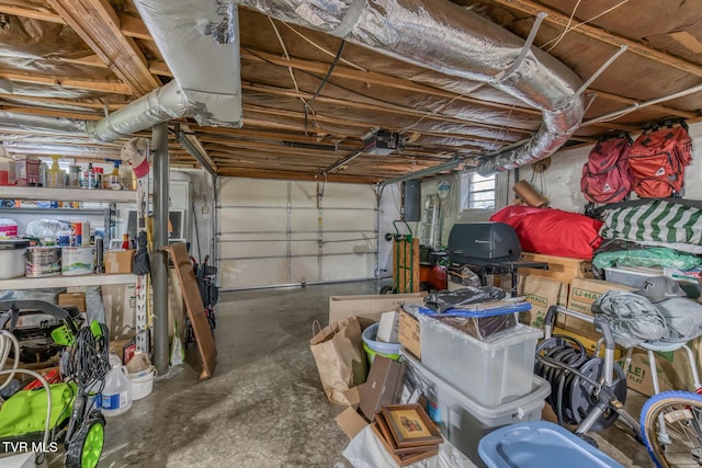 409 Brooklea Cir, Bluff City, TN 37618 - garage featuring a garage door opener and electric panel