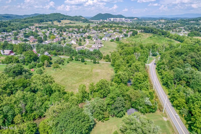 409 Brooklea Cir, Bluff City, TN 37618 - aerial overview of property's location with a mountain backdrop
