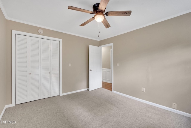 308 Cardinal Ln, Bristol, TN 37620 - unfurnished bedroom with carpet floors, crown molding, a closet, and a ceiling fan