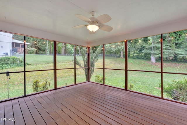 308 Cardinal Ln, Bristol, TN 37620 - unfurnished sunroom featuring ceiling fan, a wooden deck, and hardwood / wood-style flooring