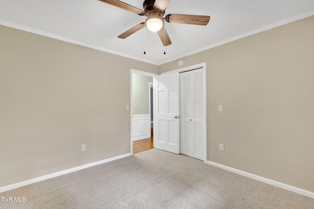 308 Cardinal Ln, Bristol, TN 37620 - unfurnished bedroom with carpet floors, a closet, crown molding, and a ceiling fan