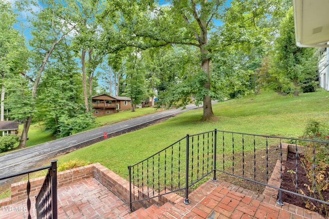 308 Cardinal Ln, Bristol, TN 37620 - view of green lawn featuring a patio area