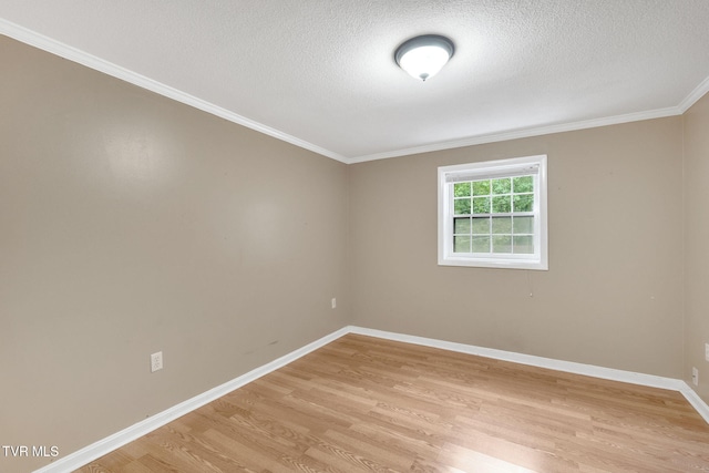 308 Cardinal Ln, Bristol, TN 37620 - empty room with light wood finished floors, crown molding, and a textured ceiling