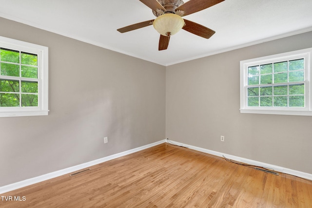 308 Cardinal Ln, Bristol, TN 37620 - unfurnished room with light wood-style flooring, healthy amount of natural light, ornamental molding, and a ceiling fan
