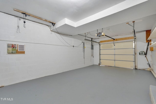 308 Cardinal Ln, Bristol, TN 37620 - garage with a garage door opener and concrete block wall