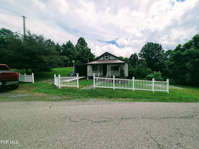 2005 Dc Caney Ridge Rd, Clintwood, VA 24228 - bungalow with a fenced front yard and a porch