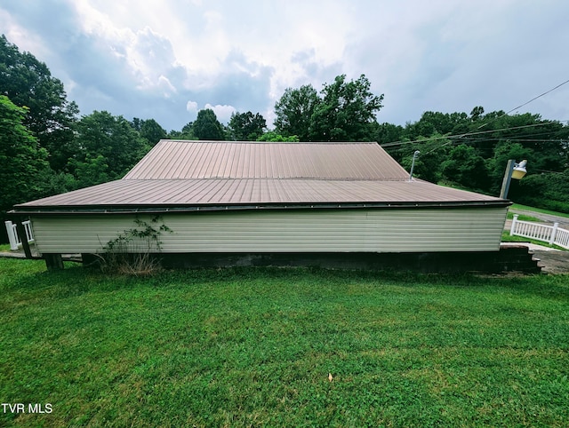 2005 Dc Caney Ridge Rd, Clintwood, VA 24228 - view of property exterior with a lawn and a metal roof