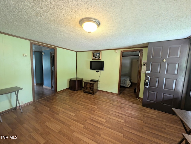 2005 Dc Caney Ridge Rd, Clintwood, VA 24228 - interior space featuring wood finished floors and a textured ceiling