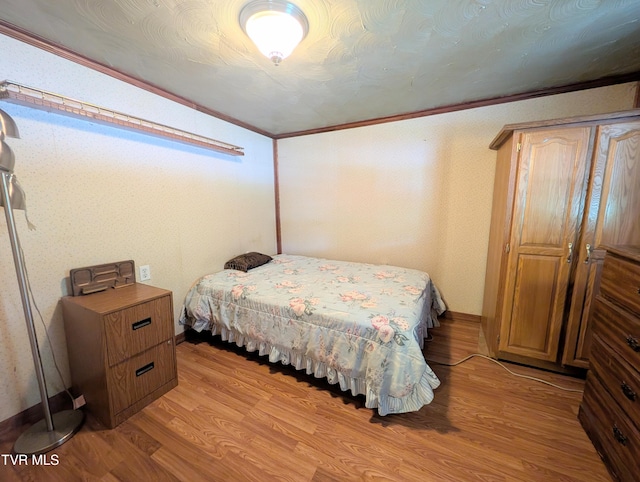 2005 Dc Caney Ridge Rd, Clintwood, VA 24228 - bedroom with light wood finished floors and ornamental molding
