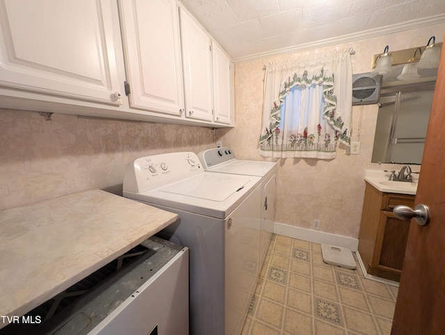 2005 Dc Caney Ridge Rd, Clintwood, VA 24228 - laundry room with washer and dryer, cabinet space, and ornamental molding