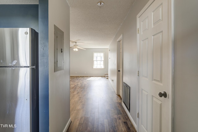 152 Gray Station Rd Unit 35, Gray, TN 37615 - hallway with a textured ceiling, wood finished floors, and electric panel