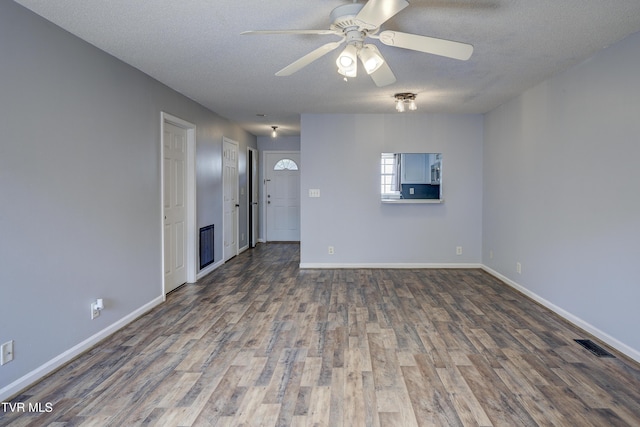 152 Gray Station Rd Unit 35, Gray, TN 37615 - unfurnished living room featuring a ceiling fan, wood finished floors, and a textured ceiling