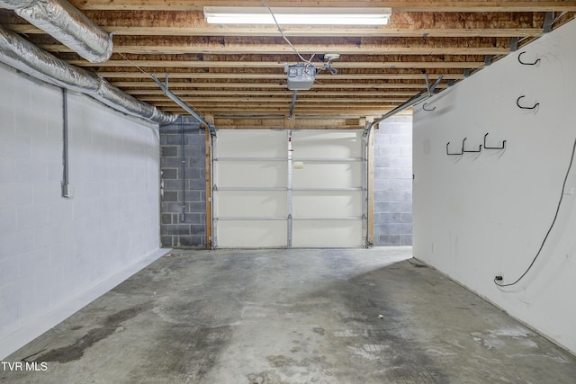 152 Gray Station Rd Unit 35, Gray, TN 37615 - garage with a garage door opener and concrete block wall