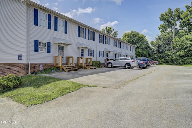 152 Gray Station Rd Unit 35, Gray, TN 37615 - view of building exterior featuring uncovered parking