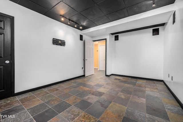 216 Mockingbird Pl, Jonesborough, TN 37659 - empty room featuring stone tile floors and rail lighting