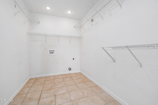 216 Mockingbird Pl, Jonesborough, TN 37659 - laundry room with washer hookup, electric dryer hookup, recessed lighting, and light tile patterned flooring