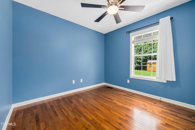 216 Mockingbird Pl, Jonesborough, TN 37659 - unfurnished room featuring hardwood / wood-style flooring, a ceiling fan, and a textured ceiling
