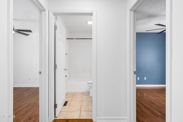 216 Mockingbird Pl, Jonesborough, TN 37659 - full bathroom featuring a ceiling fan, wood finished floors, and a textured ceiling