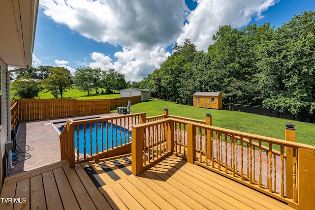 216 Mockingbird Pl, Jonesborough, TN 37659 - wooden terrace featuring a storage shed, a fenced backyard, and view of wooded area