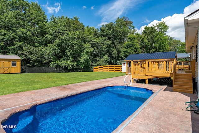 216 Mockingbird Pl, Jonesborough, TN 37659 - outdoor pool with a deck, a storage unit, a fenced backyard, and a patio area