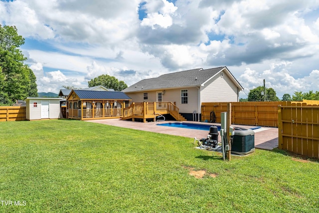 216 Mockingbird Pl, Jonesborough, TN 37659 - back of property featuring a fenced backyard, a deck, a shed, and a gazebo
