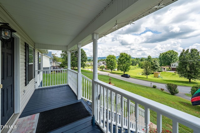 216 Mockingbird Pl, Jonesborough, TN 37659 - wooden porch with a lawn