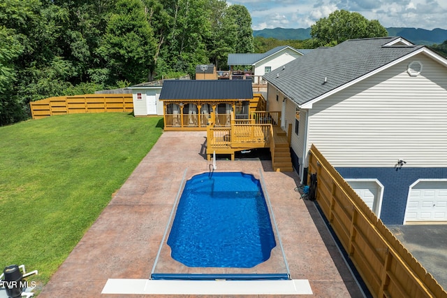 216 Mockingbird Pl, Jonesborough, TN 37659 - rear view of house featuring a deck with mountain view and an outdoor structure