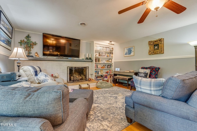 312 Timberlane Rd, Bristol, TN 37620 - living room with wood finished floors, a fireplace, and ceiling fan