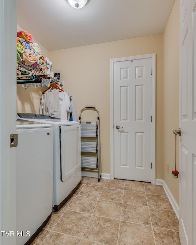 312 Timberlane Rd, Bristol, TN 37620 - washroom featuring separate washer and dryer and light tile patterned flooring